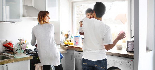 Family of three in the kitchen