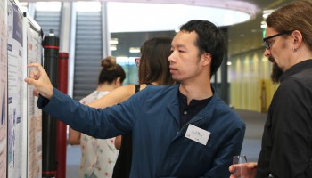 Discussions during the poster sessions at COMDI 2018